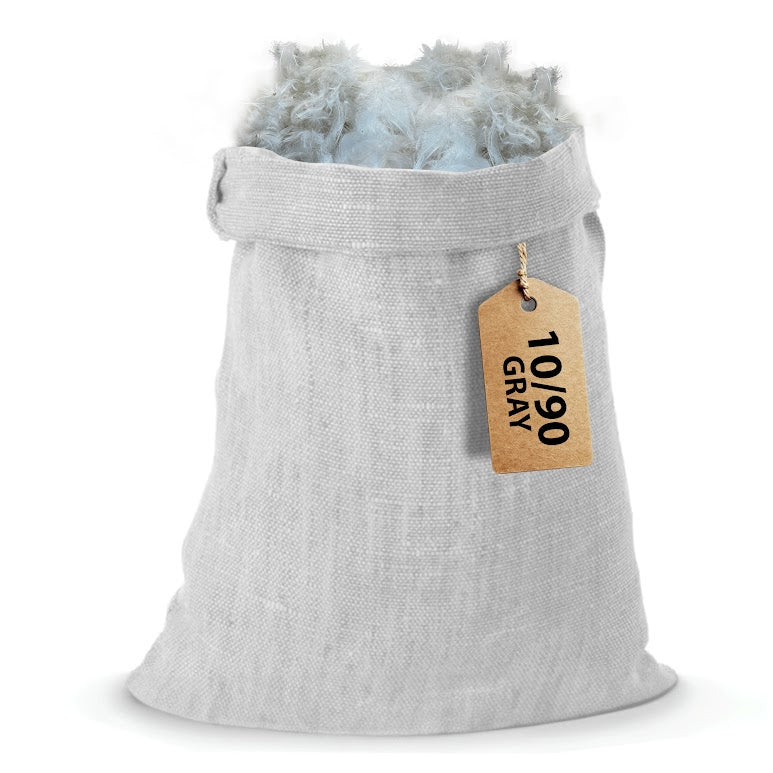A gray canvas bag containing a collection of pillows filled with a 10/90 feather blend, offering luxurious comfort and support.